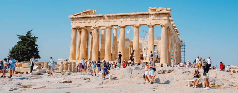 Athens: Acropolis and Parthenon Guided Walking Tour - Entering the Acropolis with a guide who actually connects the dots