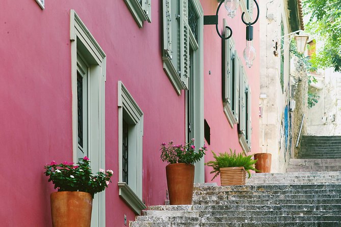 Athens: Ancient Corinth & Nafplio Full Day Trip with Swim - Arvanitia Beach swim: a scenic break, with rocky-shore reality