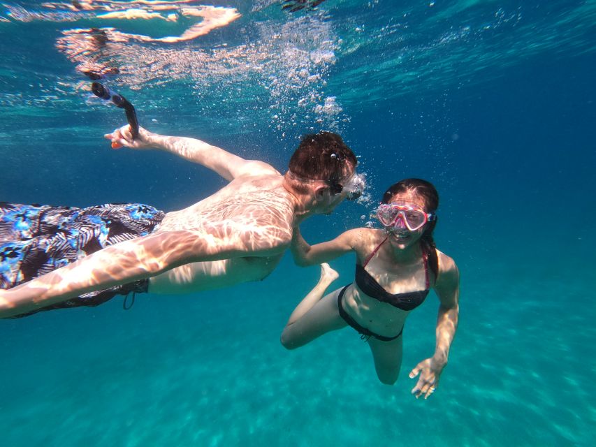Athens: Catamaran Cruise with Fresh Lunch and Wine - Vouliagmeni Bay: a famous Athens Riviera spot with a fresh swim hour