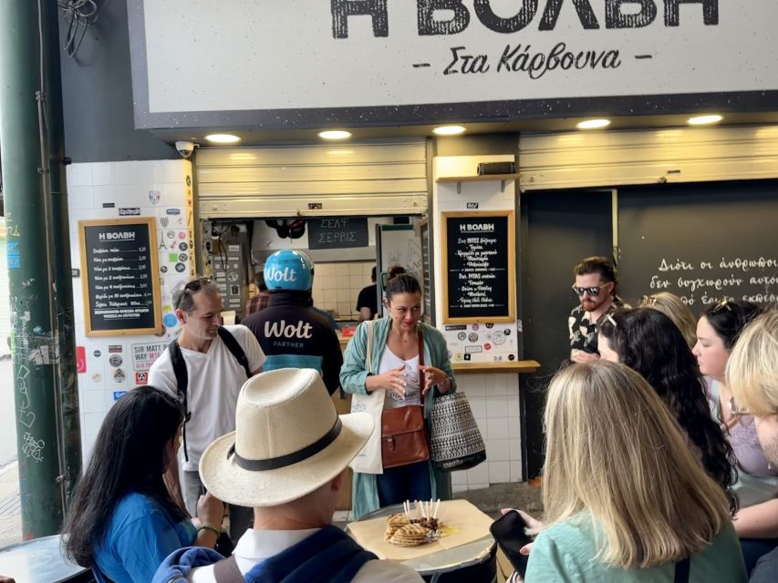 Athens: Greek Food Tasting and Market Walking Tour - Meze and spirits at a traditional restaurant ending
