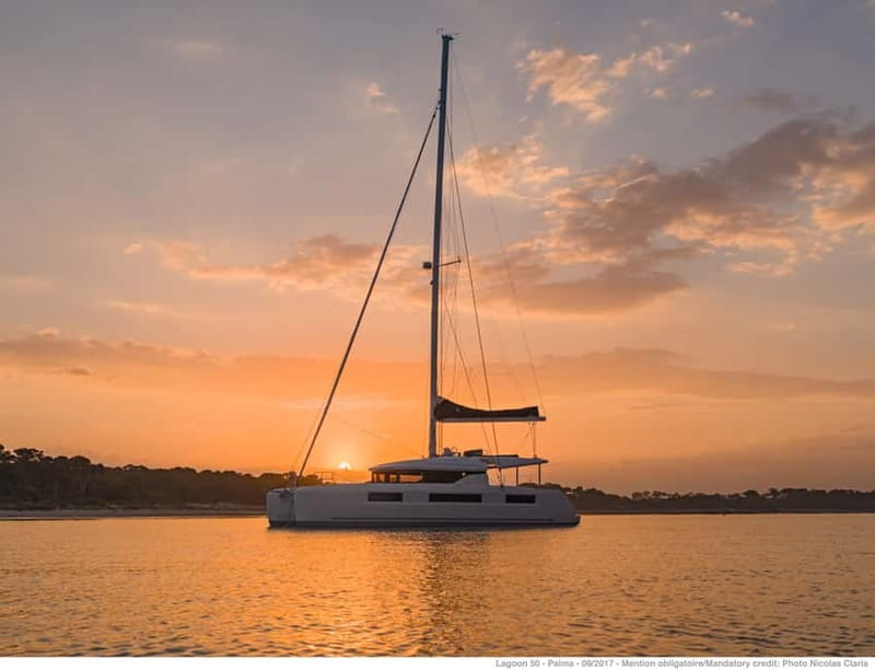 Athens: Half-Day Sunset Catamaran Cruise with Meal & Drinks - A comfortable catamaran at sea, plus the small-group vibe