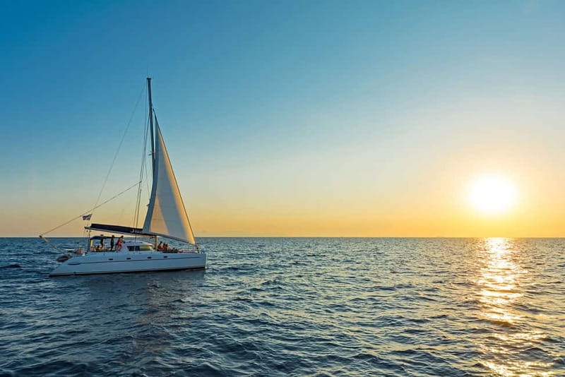 Athens: Half-Day Sunset Catamaran Cruise with Meal & Drinks - Lunch on the water: seafood pasta, salads, appetizers, and Greek wine