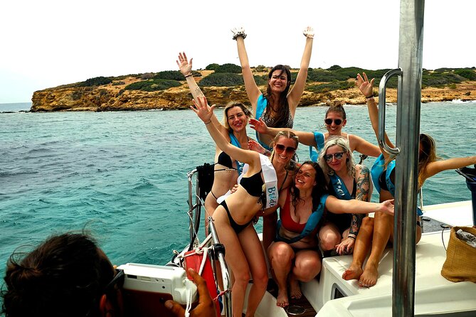 Athens Riviera Catamaran tour with fresh Meal Drinks and Swimming - Stop 1: Vouliagmeni Bay Swim Time and Snorkeling