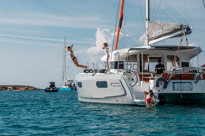Athens Semi private Morning Catamaran cruise with meal & drinks - Stop 2: Vouliagmeni Beach near Astir Beach Hotel, for a second swim stretch