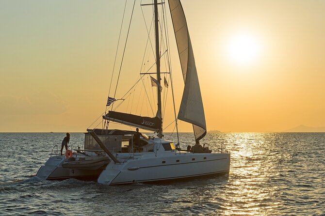 Athens Semi Private Sunset Catamaran Cruise with meal & drinks - Stop 2 off Kavouri and Hydrousa: clearer water and a better swim payoff