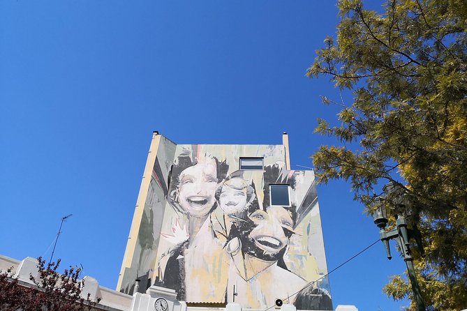 Athens Urban Street Art Tour - Omonoia murals: older walls with real pressure behind them