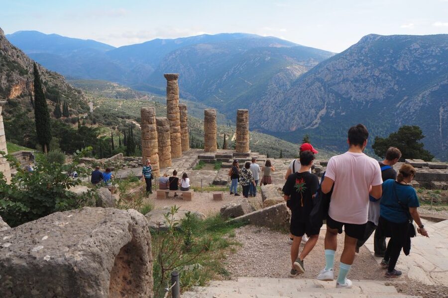 From Athens: Day Tour to Delphi - Arriving at Delphi: Omphalos and the Oracle slopes
