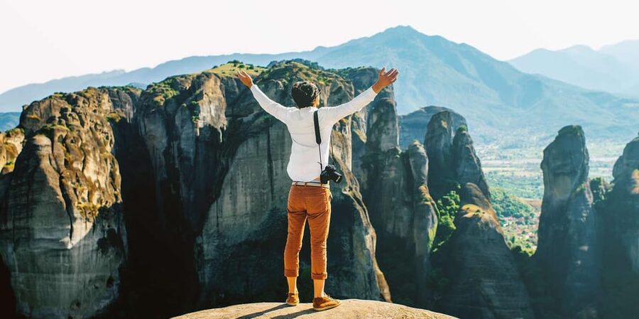 From Athens: Meteora Full-Day Trip with Guide on Luxury Bus - The Meteora photo stop, then three monasteries picked for the day