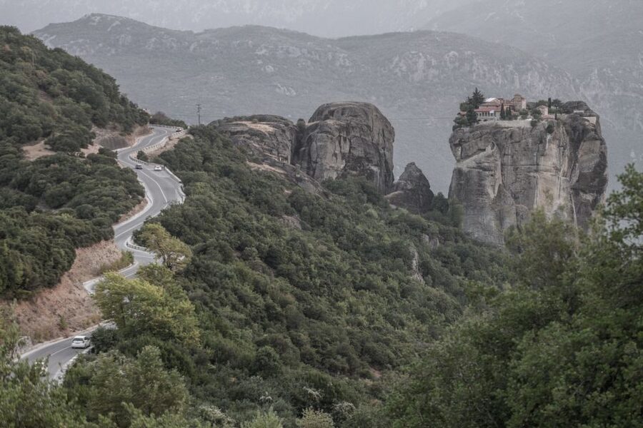 From Athens: Meteora Train Trip with Overnight Stay - St Nicholas Badovas hermit caves and the Byzantine church stop