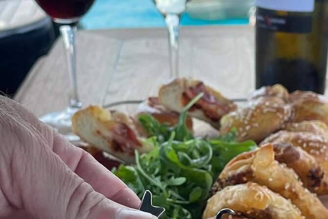 Greek Gastronomy & Wine Pairing Cruise with a Sommelier in Athens - Wine pairing: what is included, and what to buy if you want more