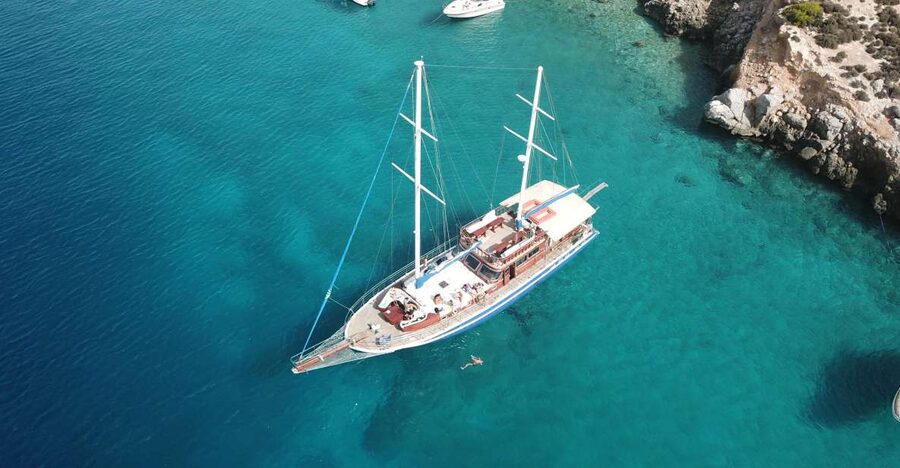 Half-Day Athens Cruise: Swim Stop,Lunch, and Drinks Included - Boarding day vibes: coffee, pastries, and a comfortable wooden boat