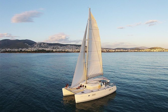 Luxury Catamaran Cruise from Athens with Traditional Greek Meal and BBQ - Swim stops that actually work: towels, goggles, and when to go in