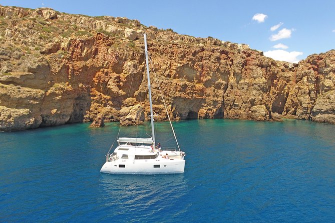 Luxury Catamaran Cruise from Athens with Traditional Greek Meal and BBQ - Unlimited drinks, sun deck comfort, and staying in control