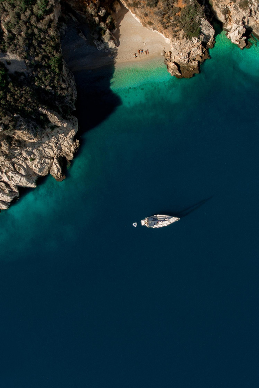 Nafplio Sun Sail Cruises | Semi-Private Half Day | With Meal - Between Romvi and Daskalio, with Tolo’s coastline in view
