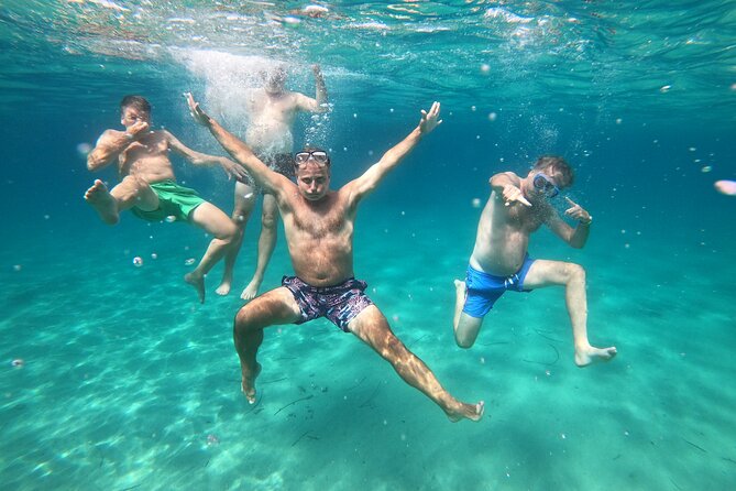 Sail the Athenian Coastline on a Catamaran with Meal & Wine - Stop 2, Vouliagmeni Bay, swimming with views of a premium coastline