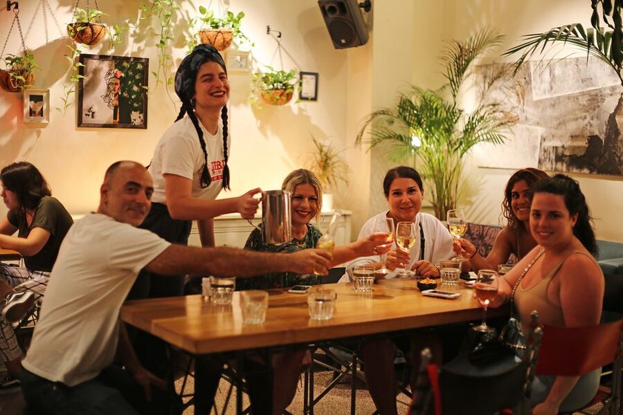 Twilight Athens Tour inc. rooftops, tastings & 3 drinks - Three themed bar stops, local spirits, and courtyards with character